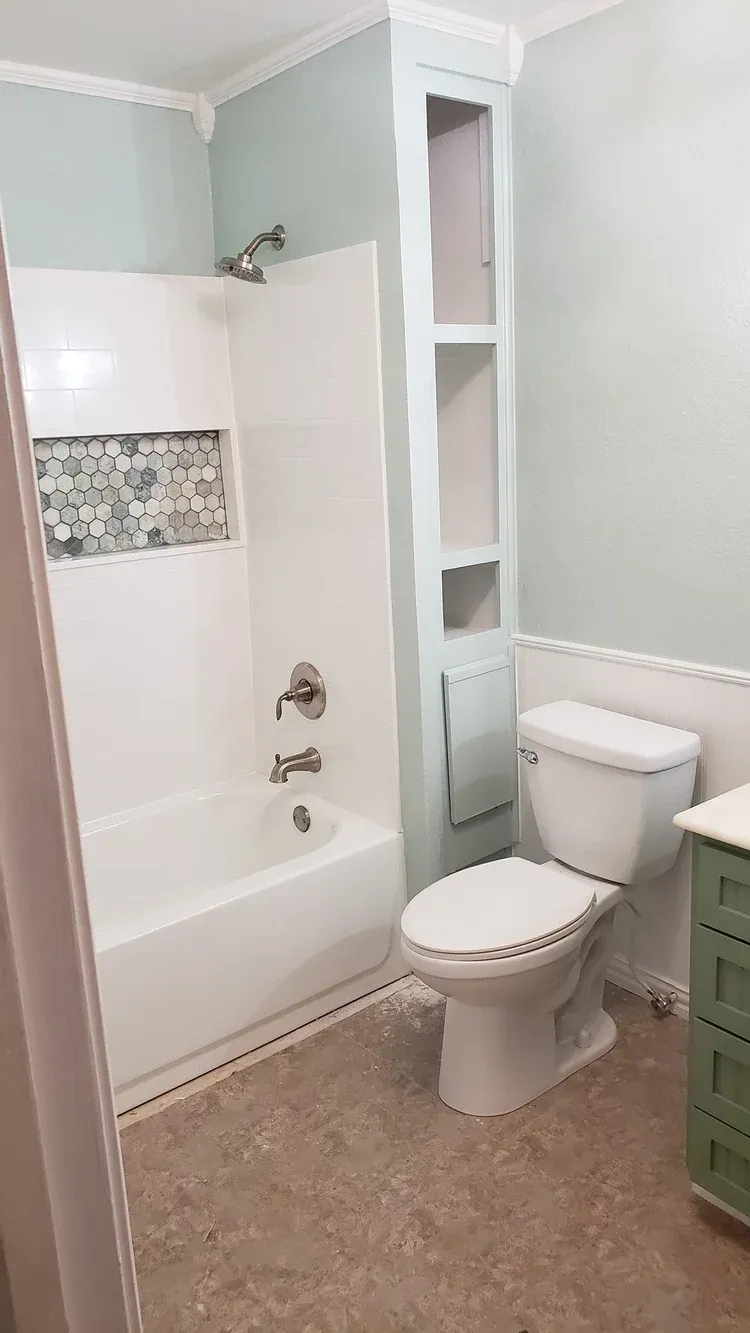 Greenville Bathroom linear drain and pebble floor detail