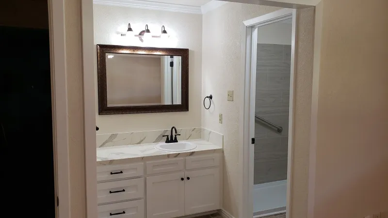 Hunt County Bathroom faux tile tub and shower surround