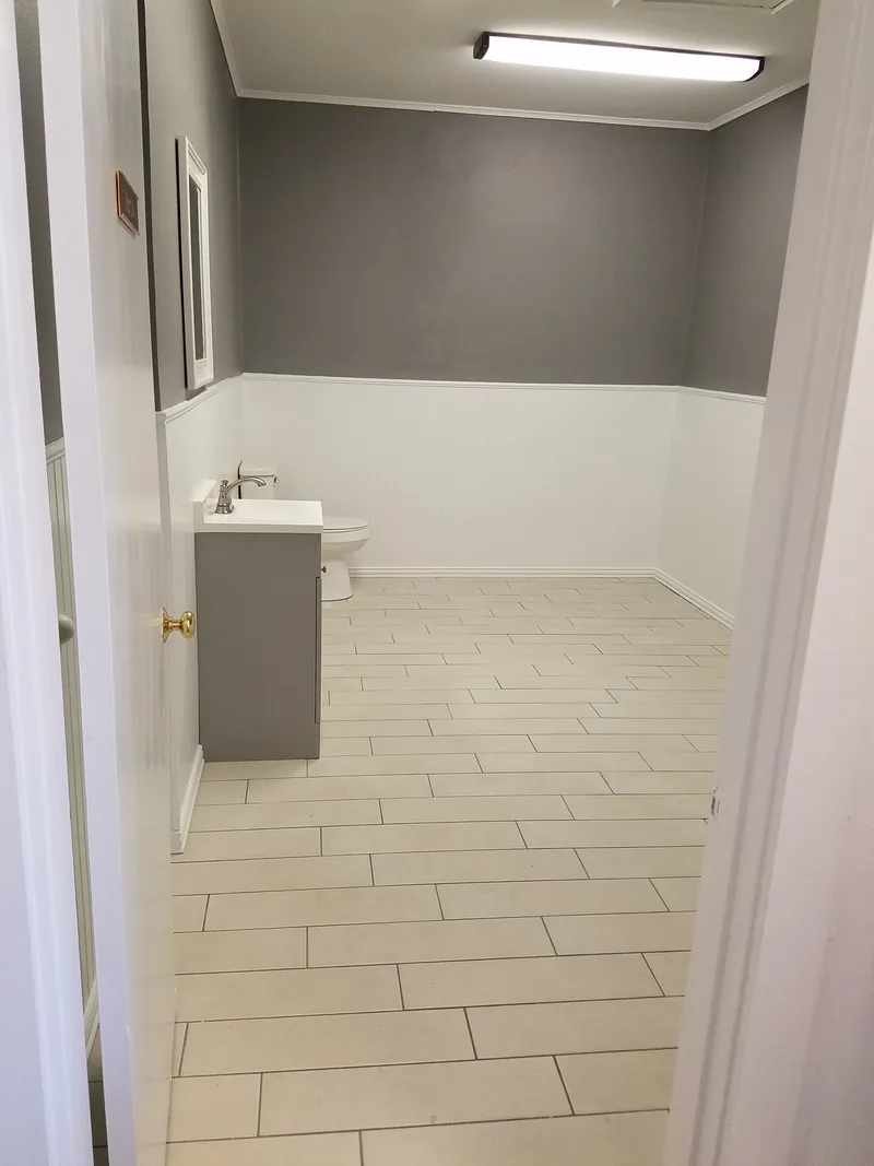 Economical tub-to-shower conversion details